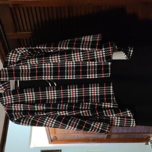 Houndstooth print jacket with black dress